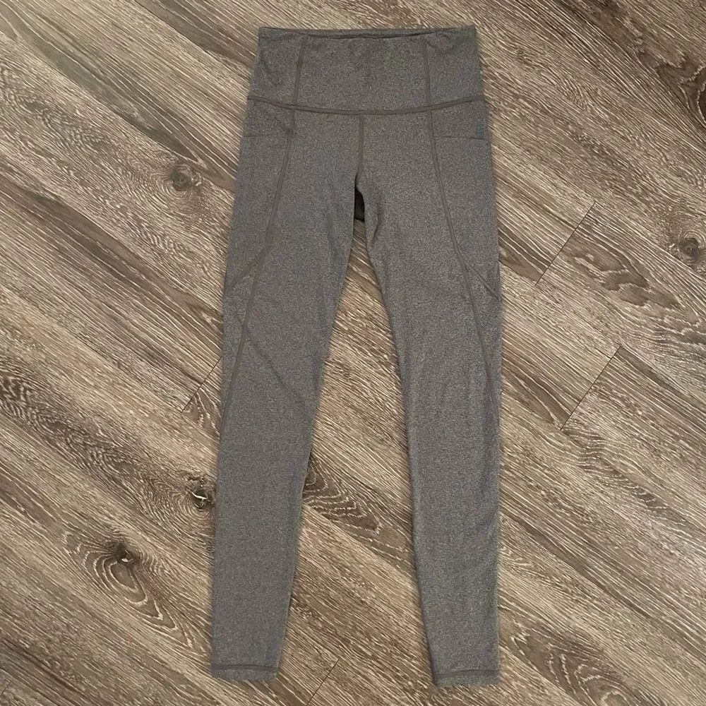 Athleta stash pocket salutation tight